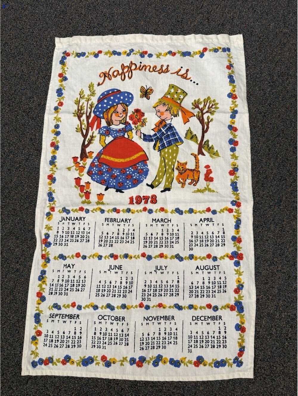 Vintage 1976 Linen Cloth Wall Hanging Calendar Happiness Is...15"x26"